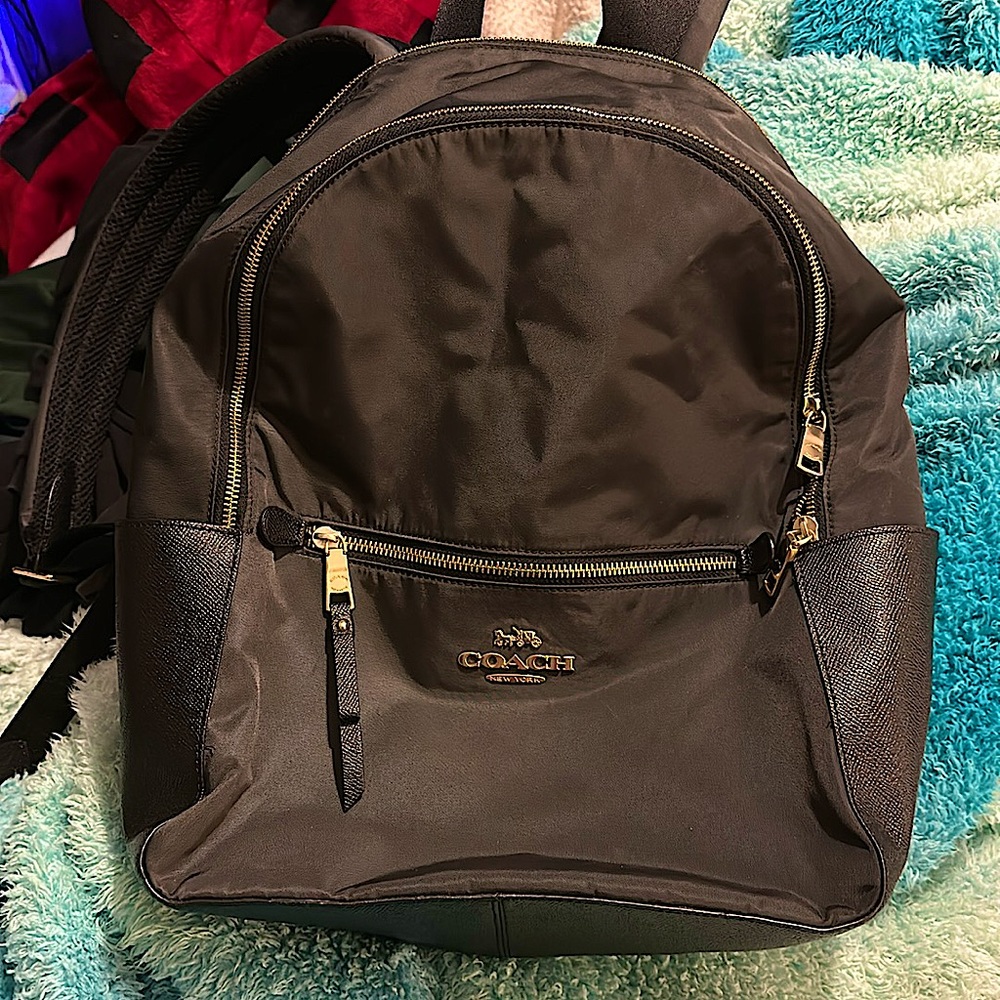 Coach Addison backpack with laptop slot.